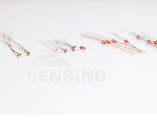 NTC Thermistor เทอร์โมมิเตอร์แบบ Radial Glass สำหรับการตรวจวัดอุณหภูมิ Delicacy สูง
